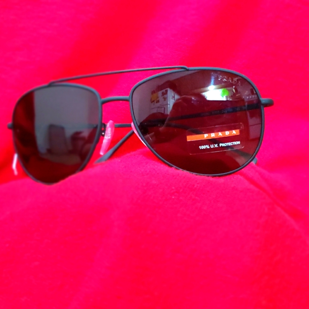 Prada women's Aviator style sunglasses